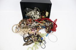 A collection of assorted costume jewellery. Including necklaces, bracelets, etc.