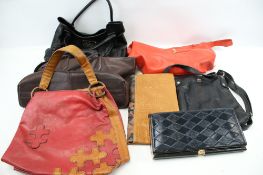 An assortment of vintage ladies handbags.