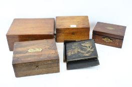 An assortment of 19th century and later wooden boxes.