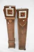 Two 1930s oak cased grandmother clocks. With square dials, max.