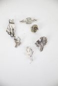 Six silver brooches