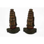 A pair of cast metal bookends stamped 'Iron Barque Macquarie'.
