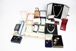 A collection of 25 boxes of assorted costume jewellery