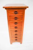 A Cachet mahogany chest of eight drawers.