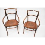 Two bent wood open armchairs.