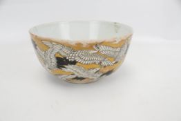 A Japanese '1000' crane bowl, decorated and gilt with lying cranes.