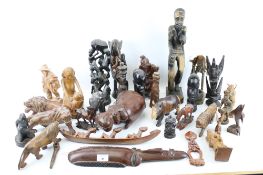 A collection of assorted carved wooden items.