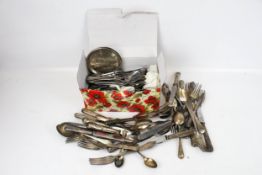 A collection of assorted silver plated flatware.