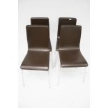 Set of four contemporary dining chairs with chrome legs.