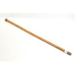 Silver topped Malaka walking cane. Hallmark Birmingham, maker H.S, 86cm long.