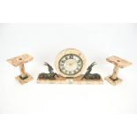 An Art Deco mantle clock garniture with antelope figures.