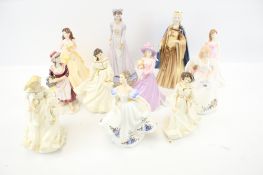 A collection of porcelain figures of ladies.