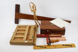 A collection of assorted vintage artist's accessories.