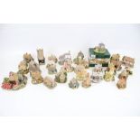 A collection of assorted Lilliput Lane model cottages.