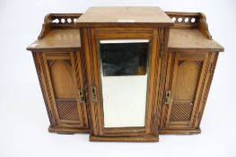 An oak smoking cabinet.