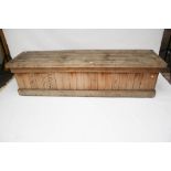 A large pine outdoor trunk chest box.