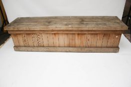 A large pine outdoor trunk chest box.