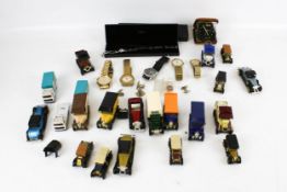 A group of vintage watches and diecast vehicles. Including Sekonda, Avia, Days Gone, etc.