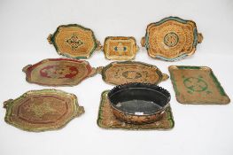 A collection of papier mache trays and a regency metal planter.