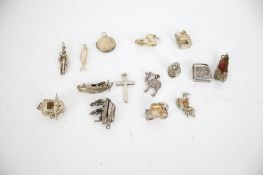 15 silver charms including a radio,