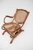 An American style bentwood wicker rocking chair.