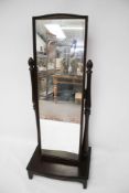 A Stagg dark stained Cheval full length dress mirror on stand.