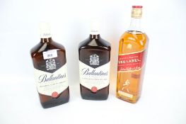 Three 1ltr bottles of Scotch whisky. Including two Ballantine's and a Johnnie Walker Red label.