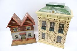 Two vintage dolls houses.