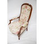 A French style mahogany framed upholstered open armchair.