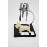 An Art Deco manicure set with 'Scotty' terrier dog.