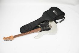 A Yamaha Pacifica electric guitar and bag. PAC112X s/n. Q128282 with a 'Music Land' padded bag.