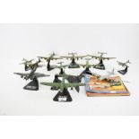 A collection of twelve assorted diecast model military aircraft.