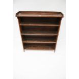 A vintage dark oak free standing bookcase shelf unit.