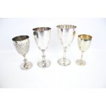 Four silver-plated sporting trophy cups or goblets. Including Mappin & Webb 'Cadet Corps.