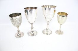 Four silver-plated sporting trophy cups or goblets. Including Mappin & Webb 'Cadet Corps.