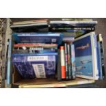 A collection of assorted aircraft and aviation related books.