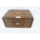 A vintage straw work box. L27cm x D19.