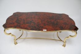 A contemporary marble top brass framed coffee table.