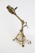 A vintage adjustable brass table lamp.