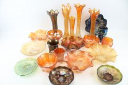 A collection of twenty-one assorted pieces of vintage carnival glass.