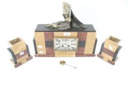A French marble Art Deco mantel clock garniture.