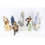 A collection of nine assorted 20th century porcelain figures.