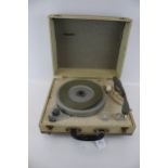A vintage Westminster portable record player.