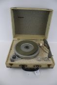 A vintage Westminster portable record player.