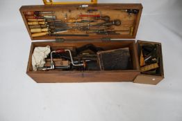 A pine carpenter's tool chest and contents.