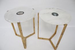 A pair of contemporary marble top side tables.