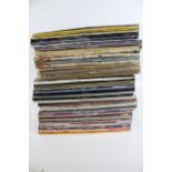 A collection of assorted vintage vinyl LP records.