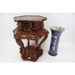 A Chinese hardwood stand together with a blue and white vase Condition Report: Stand