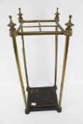 An iron and brass mounted square four-division stick stand.