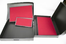 A set of red exhibition stand folding display boards.
